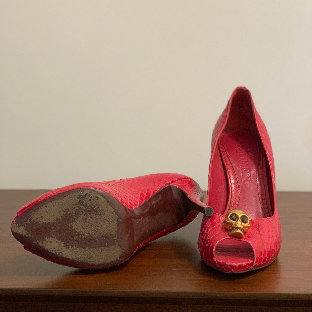 Alexandr MCQueen python open toe pumps.